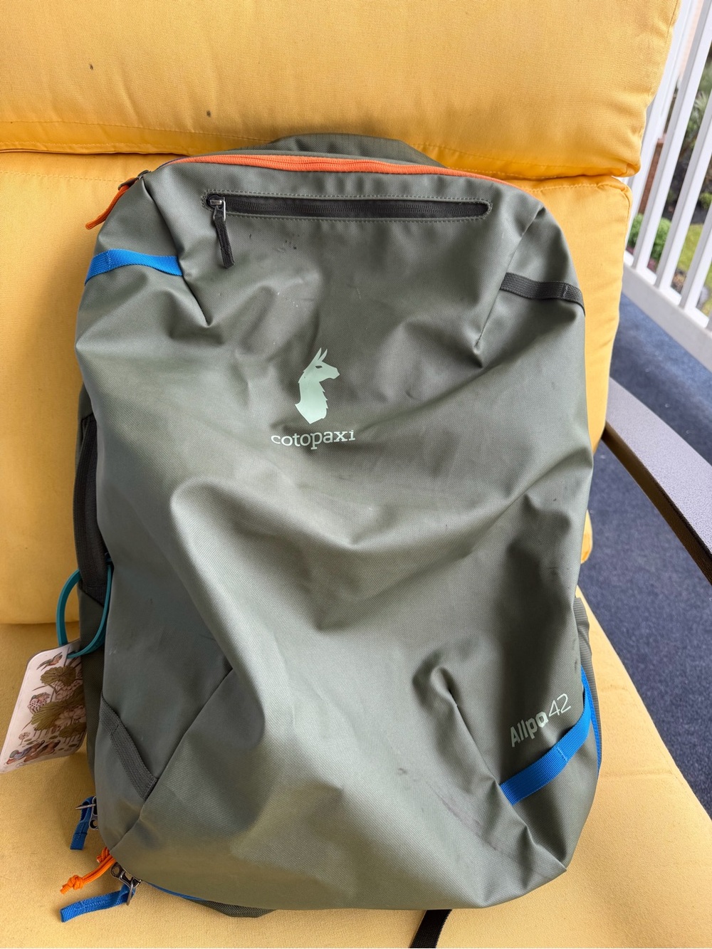 cotopaxi Allpa 42 Backpack in Olive Green with Blue and Orange Accents
